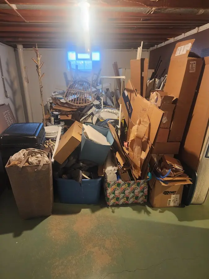 Roll-off dumpster container at job site for 15 Yard Dumpster Rental in Lakes of the Four Seasons